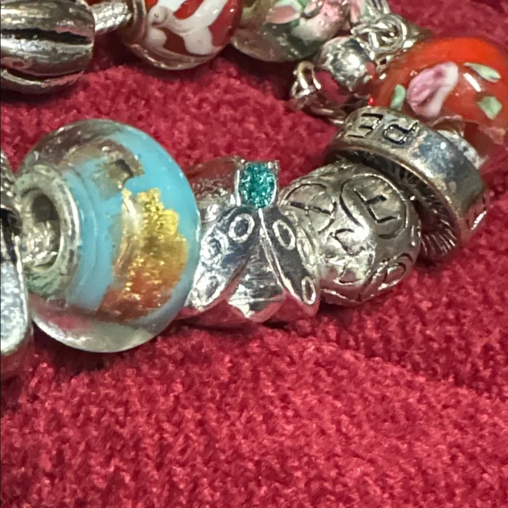 2 glass Bead and Elegant Silver Bracelets. In great condition.